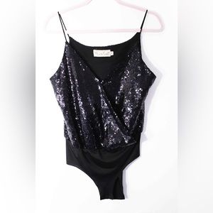 Santa Maria

Colombian brand
Sequin bodysuit in perfect condition